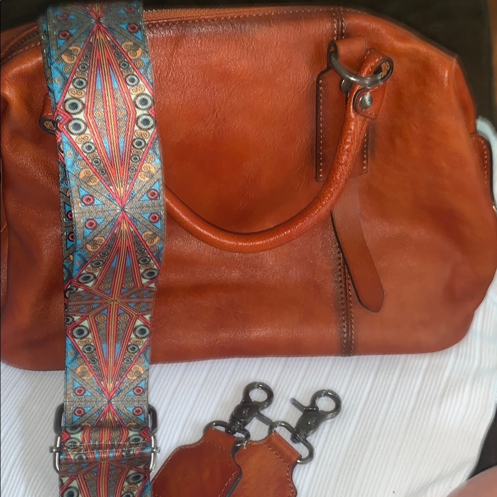 Leather and Orange Shoulder Bag with Patterned Strap. Versatile.